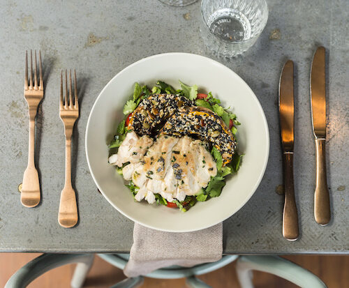 Sesame crusted pumpkin, chicken and parsley chopped salad
